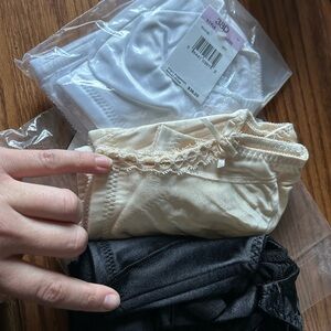 Cream, Black, and White Bras